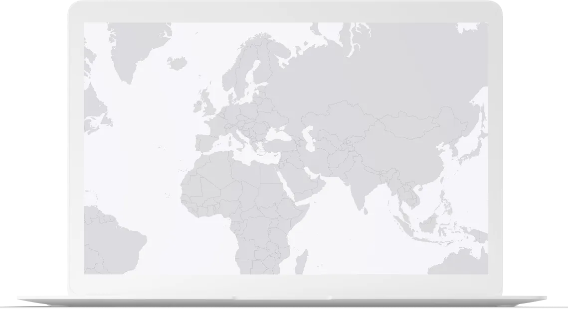 A laptop mockup with a world map on the screen