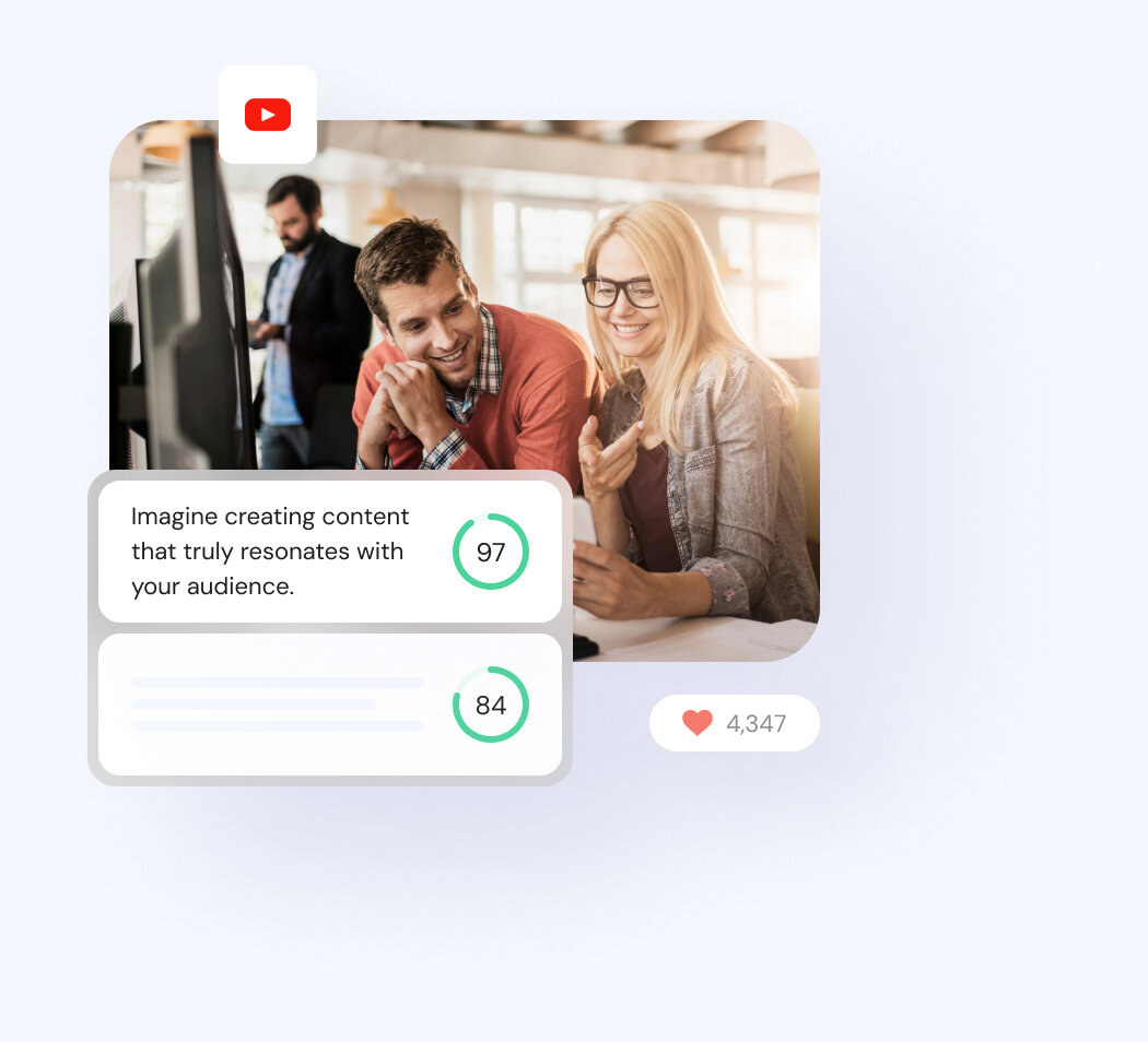 Two people sitting in an office next to Anyword product illustration showing predictive performance scoring on ad copy