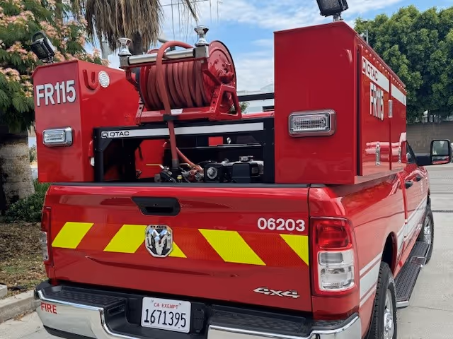 An LAFD pickup truck equipped with a pump, water tank, and other equipment for swift medical response in the field.