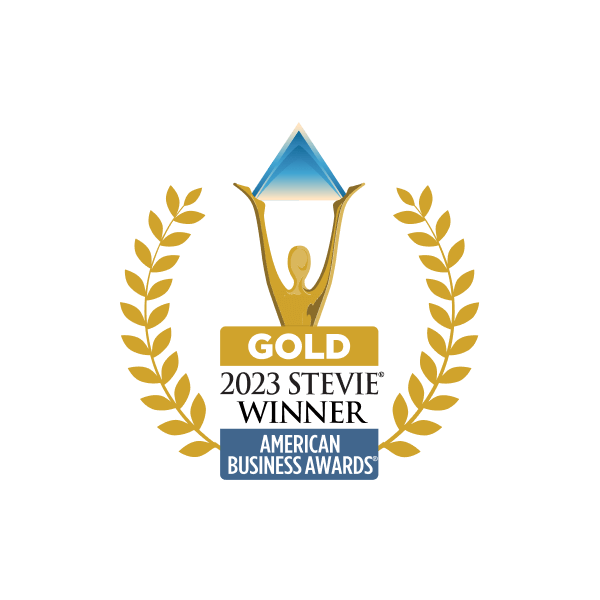 Gold 2023 Stevie Winner trophy with a blue pyramid held by a golden figure, surrounded by golden laurel branches and labeled American Business Awards.