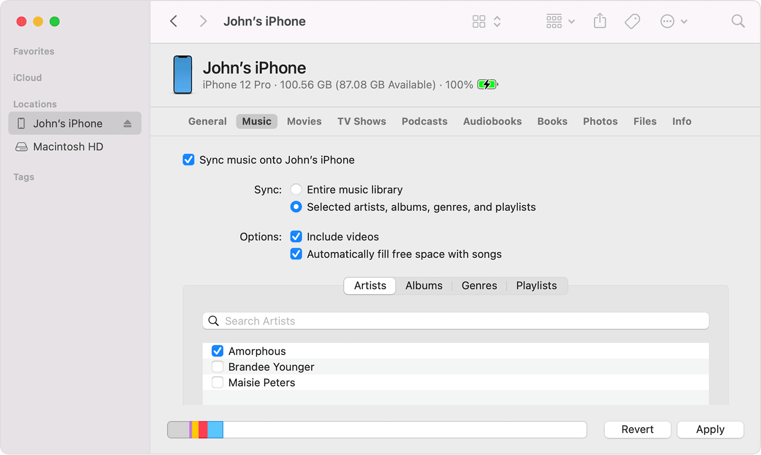 Finder window on macOS Monterey showing music sync options for a connected iPhone named "iPhone". The sidebar displays the connected device, and the main panel shows options to sync music.