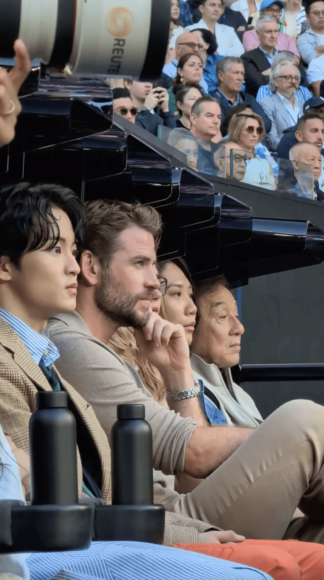 Reaction from the stands of an Autralian Open game. Featuring Jackie Chan and other famous figures