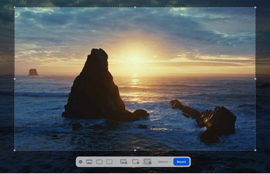 En el escritorio de la Mac, las opciones de grabación de pantalla se muestran en la parte inferior de la pantalla y se seleccionó una parte de la pantalla para grabar.
