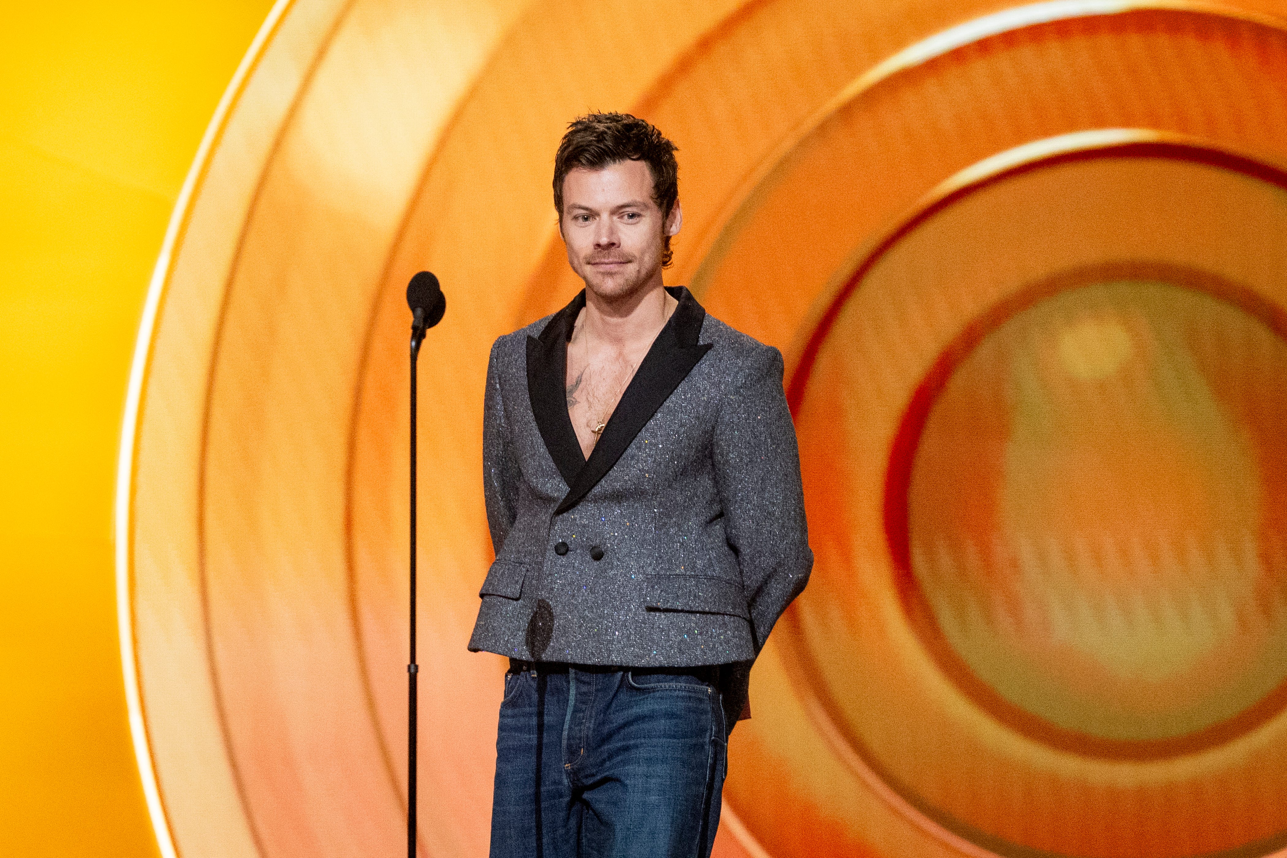 Harry Styles speaks onstage during the GRAMMY Awards on Feb. 1, 2026, in Los Angeles.