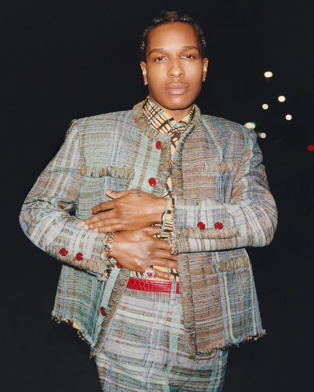fashionable person posing in a unique outfit at night fashionable person posing in a unique outfit at night