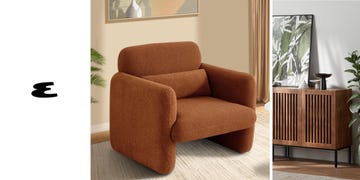 Modern brown armchair in cozy living room setting Modern brown armchair in cozy living room setting