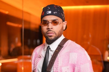 Louis Vuitton - Paris Men's Fashion Week FW2026 - Front Row Chris Brown poses at Paris Men's Fashion Week