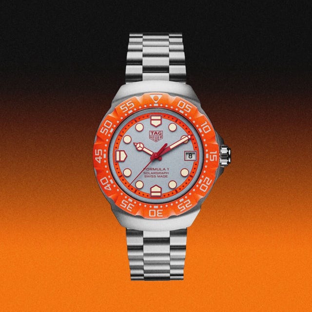 tag heuer formula 1 watch with orange accents and stainless steel bracelet. tag heuer formula 1 watch with orange accents and stainless steel bracelet.