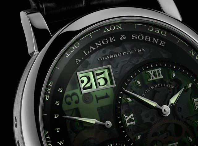 luxury watch with a decorative dial and visible tourbillon mechanism luxury watch with a decorative dial and visible tourbillon mechanism