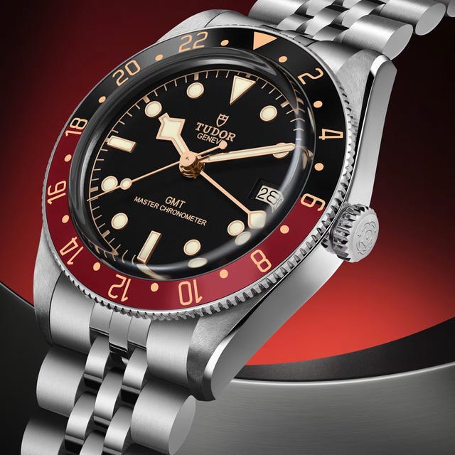 tudor gmt master chronometer watch with red and black bezel on a silver bracelet. tudor gmt master chronometer watch with red and black bezel on a silver bracelet.