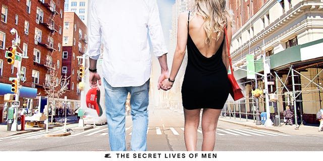 Couple holding hands while walking in a city street, with buildings and traffic lights in the background. Couple holding hands while walking in a city street, with buildings and traffic lights in the background.