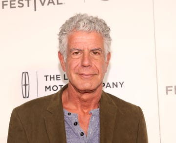 "WASTED! The Story of Food Waste" Premiere - 2017 Tribeca Film Festival Anthony Bourdain smiles wearing suede jacket