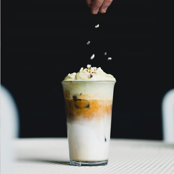 barista preparing coffee and a dessert beverage barista preparing coffee and a dessert beverage