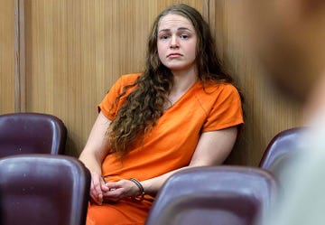 US-NEWS-MODEL-MURDERCHARGE-1-MI defendant courtney clenney, a miami onlyfans model accused of murdering her boyfriend, sits in miami dade circuit court judge laura sheron cruz's courtroom at the miamidade county courthouse in miami on dec 19, 2024 al diazmiami heraldtribune news service via getty images