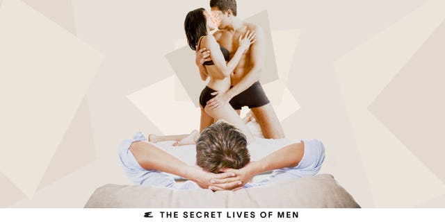 A couple embraces intimately in the foreground while a man relaxes on a sofa in the background. A couple embraces intimately in the foreground while a man relaxes on a sofa in the background.