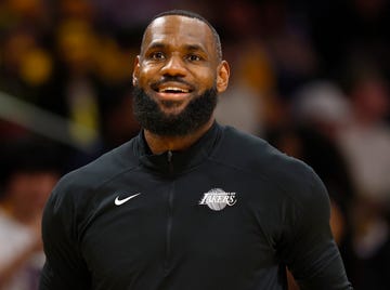 Lebron James in March 2024 lebron james smiling, he wears a black zipup jacket with a los angeles lakers logo