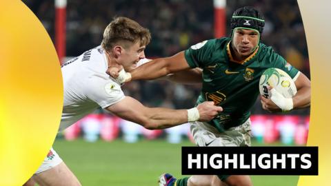 Tommy Freeman of England grabs Kurt-Lee Arendse of South Africa while playing in the Nations Championship