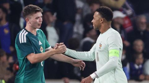 Patrick Kelly with Kylian Mbappe