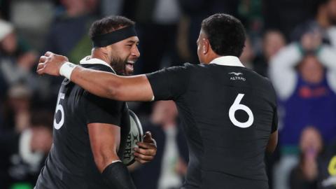 Patrick Tuipulotu and Tupou Vaa'i celebrate an All Blacks try