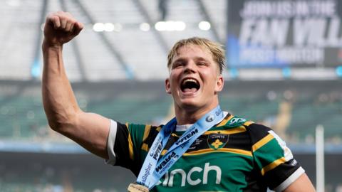 Henry Pollock celebrates