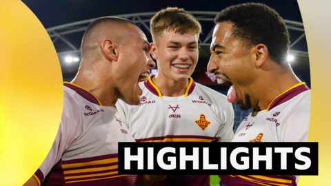 Huddersfield's Tui Lolohea, Lewis Jagger and Tanguy Zenon celebrate after victory over Hull FC