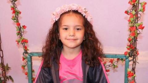 Hind Rajab smiles at the camera.