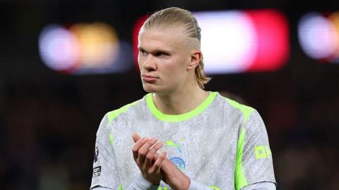 Erling Haaland looks on