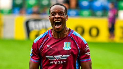Success Edogun celebrates his goal