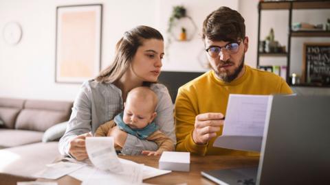 Couple looking at bills