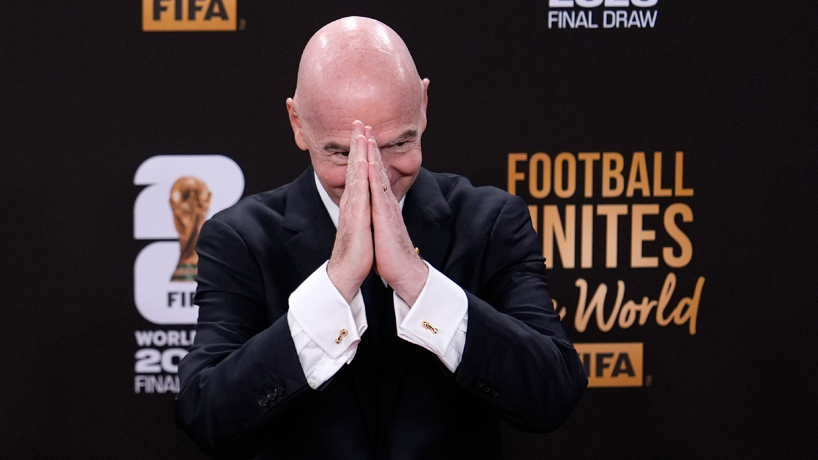 FILE - FIFA President Gianni Infantino gestures as he arrives to attend the draw for the 2026 soccer World Cup at the Kennedy Center in Washington, Friday, Dec. 5, 2025. (AP Photo/Julia Demaree Nikhinson)