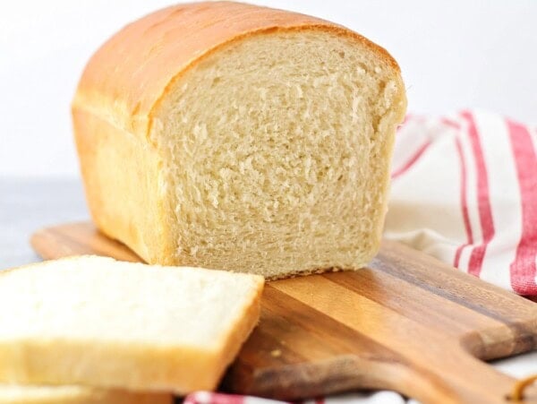 homemade bread recipe on cutting board.