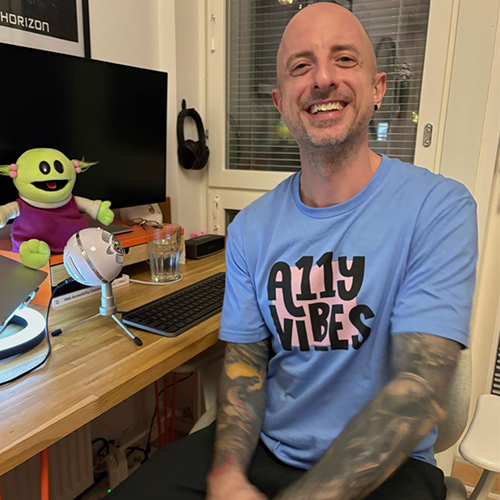Axe-con 2026 presenter wearing an a11y vibes shirt