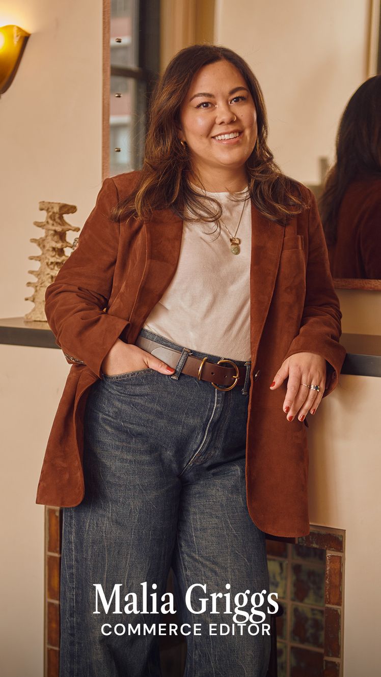Image may contain Clothing Coat Jacket Blazer Pants Adult Person Accessories Jewelry Ring Necklace and Face