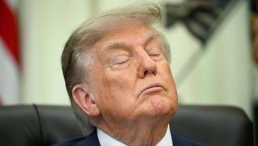 US President Donald Trump closes his eyes before signing an executive order calling for more research and flexibility on vaccines, in the Oval Office of the White House in Washington, DC, on August 10, 2026.