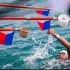 Filipino swimmer Anton Paulo Dominick Della gets his water during a feeding stop at the 4th Southeast Asia Open Water Swimming Championships off the Boracay Newcoast in Malay, Aklan Friday.
