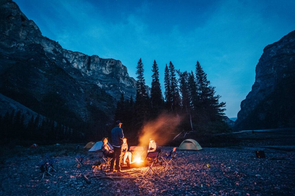 a group of people around a campfire