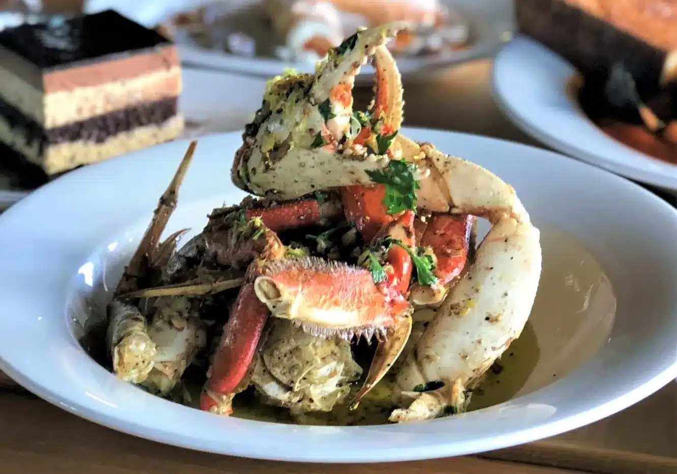 Crab with Tiramisu in the background