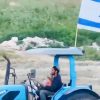 Jewish Fanatics Get On Tractors And Ride Inside Of A Christian Village And Begin Threatening Christians. They Prevent Christian Farmers From Entering Their Olive Groves. One Christian Man Enters His Farm And is Blocked By An Armed Settler. Untitled - August 16, 2026 at 15.39.50