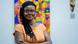 Tobore Ovuorie, a young woman with long hair wearing glasses, stands with her arms crossed smiling Tobore Ovuorie, a young woman with long hair wearing glasses, stands with her arms crossed smiling