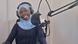 A woman in the Bidibidi FM studio A woman in the Bidibidi FM studio