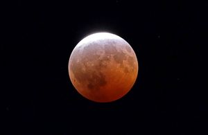 A mostly red moon.