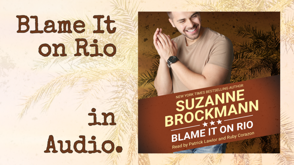 A graphic reads Blame It on Rio in Audio, and includes the square audiobook cover of New York Times bestselling author Suzanne Brockmann’s BLAME IT ON RIO, which features a handsome, laughing, dark-haired young man in a tan T-shirt and jeans. The title banner includes the words “read by Patrick Lawlor and Ruby Corazon.”