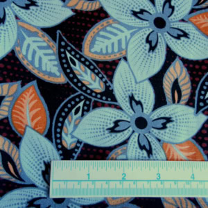 Floral fabric with measuring ruler for scale.