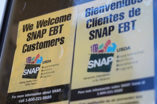 Food Aid-SNAP FILE - A SNAP EBT information sign is displayed outside of a convenience store in Baltimore, Monday, Nov. 10, 2025. (AP Photo/Stephanie Scarbrough)