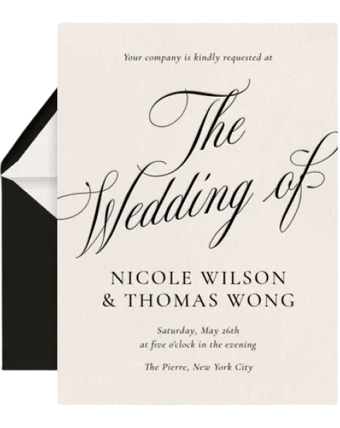 A formal wedding invitation in elegant black script on a cream background, with a black envelope.