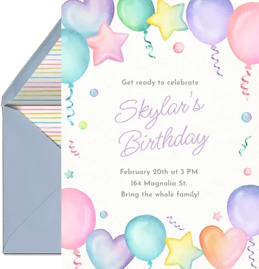 A pastel watercolor birthday invitation with balloon and star illustrations, paired with a slate gray envelope.