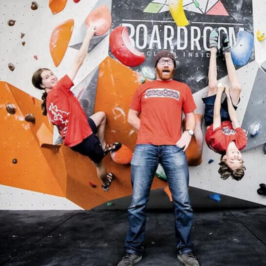 Young boy and girl on a climbing wall to raise funds to find a cure for Glioblastoma (GBM)