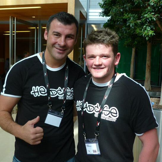 BGC Charity Day Men wearing charity t-shirts at a Charity Event raising funds to find a cure for Glioblastoma (GBM)