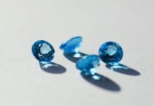 Blue Sapphire: A Stone of Beauty, Meaning, and Careful Choice blue stone on white surface
