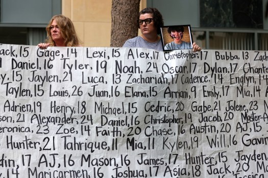 Meta Trial Federal Court Oakland Shannon Heacock, right, holds a photograph of her son Elijah during a rally outside a federal courthouse on Tuesday, Aug. 18, 2026, in Oakland, Calif. Parents and advocates gathered in front of the courthouse holding a large banner with the names of children who died from what they claim are social media related harms. Opening statements begin on Tuesday in the landmark federal multi-state social media addiction trial against Meta. (Aric Crabb/Bay Area News Group)